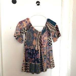 Cute off the shoulder multi colored shirt for sale!